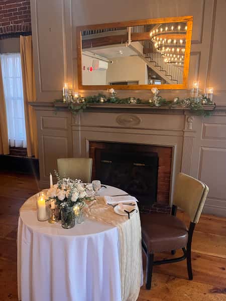 Salem - Loft room with Sweetheart table setup at fireplace