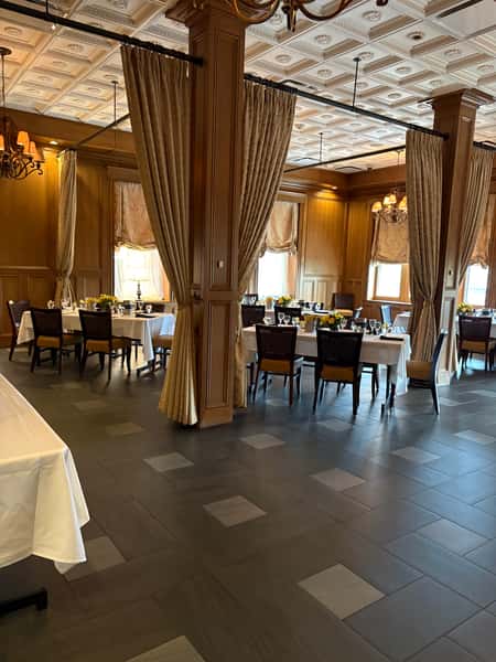 full table area view, curtain room seperators tied back
