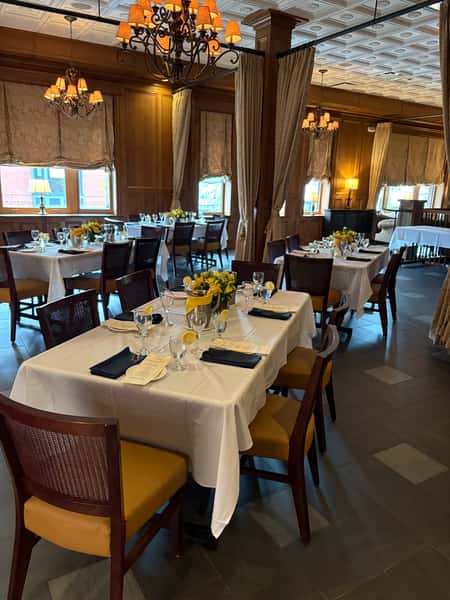 Upham Room Rehearsal, long tables diagonal across room, daylight
