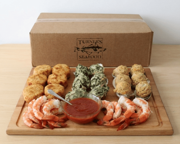 Prepared items on a display board in front of one D2D box