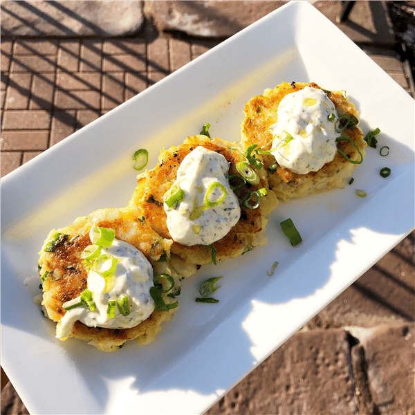 three crab cakes on a plate
