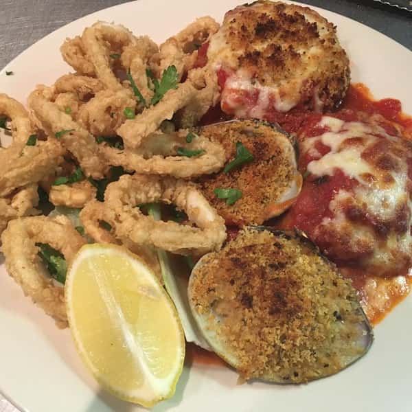 Calamari with baked dish and lemon slice