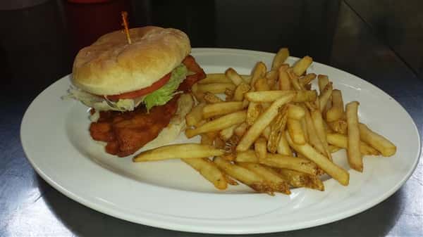 Chicken sandwich with a side of french fries