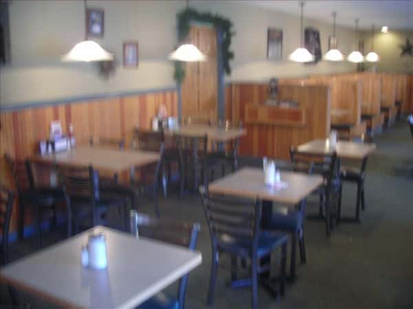 Dining area with chandeliers hanging above