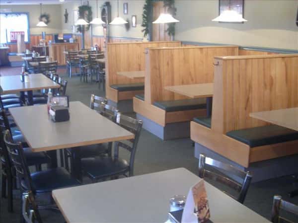 Dining area with chandeliers hanging above