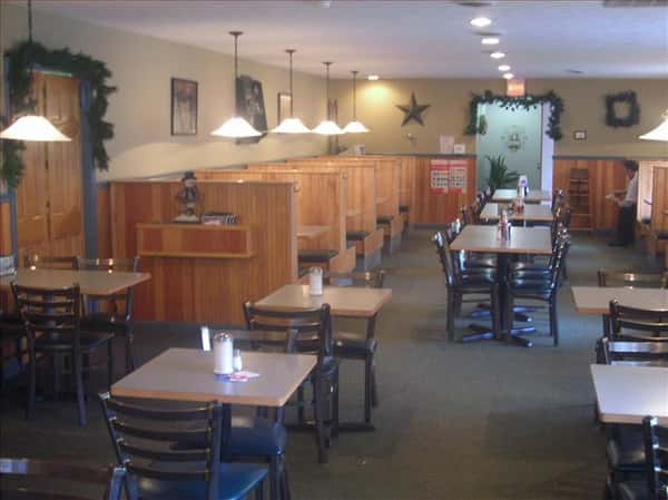 Dining area with chandeliers hanging above