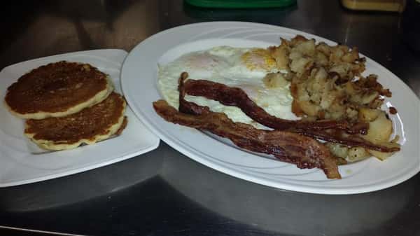 Pancakes, bacon, eggs, with hashbrowns