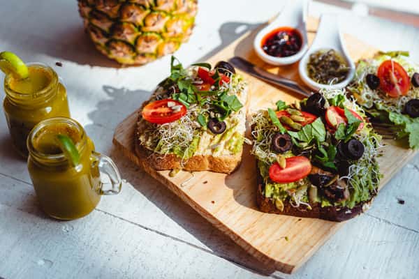 close-up-of-fresh-avocado-toast-with-toppings-served-with-ju-original.jpg