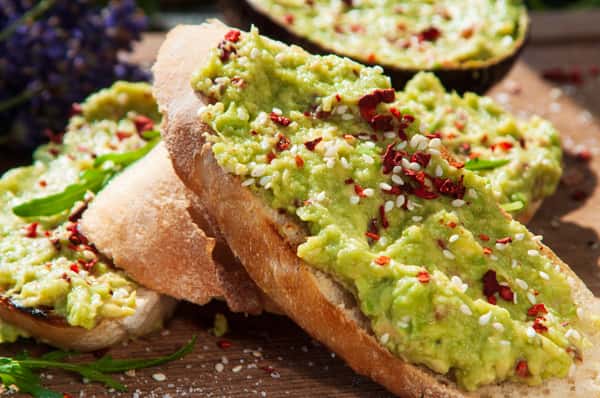 close-up-of-avocado-toast-topped-with-sesame-seeds-and-chili-original.jpg