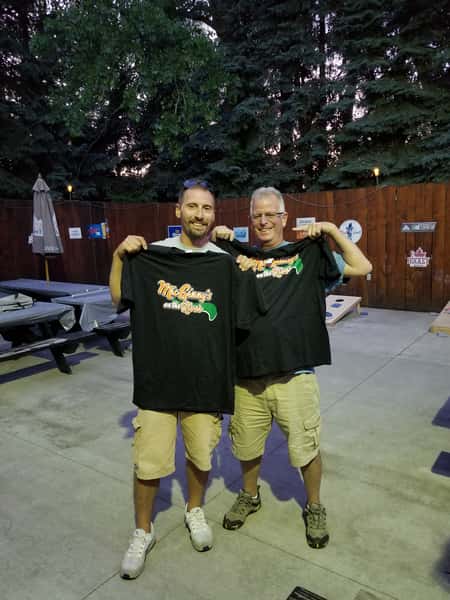 Men holding tshirts