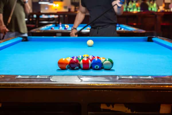 Pool table with balls racked up