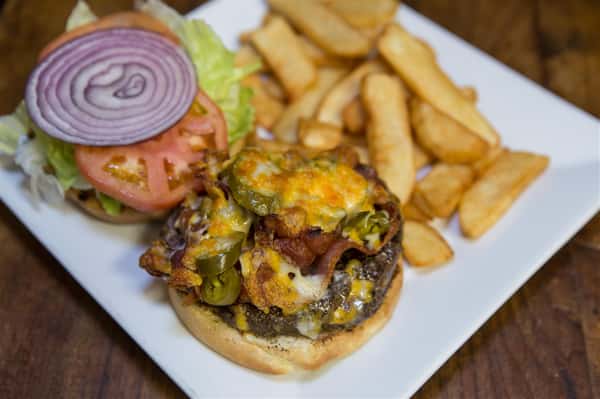 chili cheeseburger with a side of fries