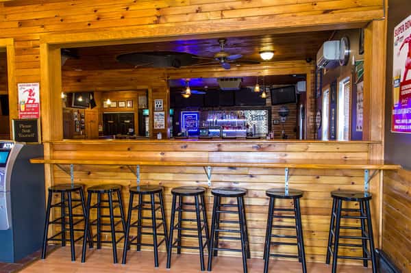 indoor bar area with stools