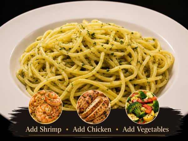 Spaghetti aglio e olio tossed with garlic, olive oil, and fresh herbs