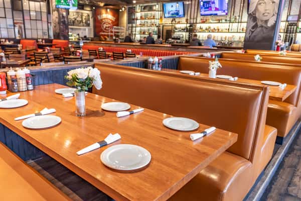 Comfortable peanut butter leather booth dining.