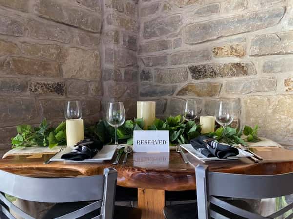 wood table decorated and reserved for special guests.