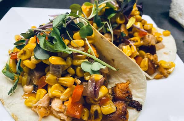 tacos with chicken, corn and peppers
