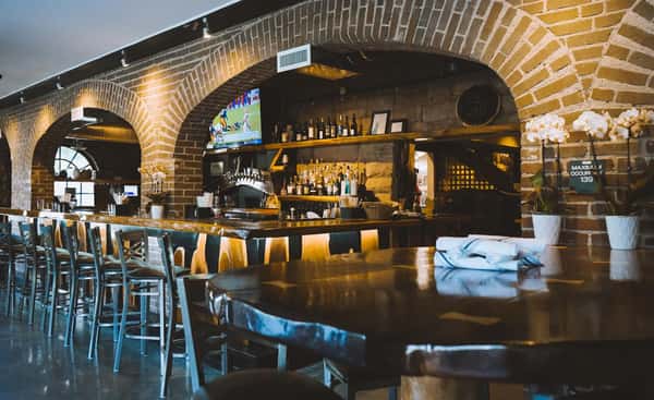 view of the bar at black river tavern