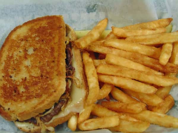 The Reuben Sandwich with a side of French Fries