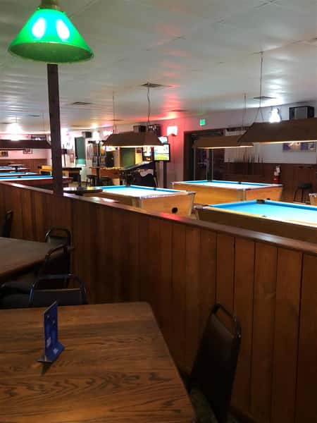 dining area overlooking pool tables