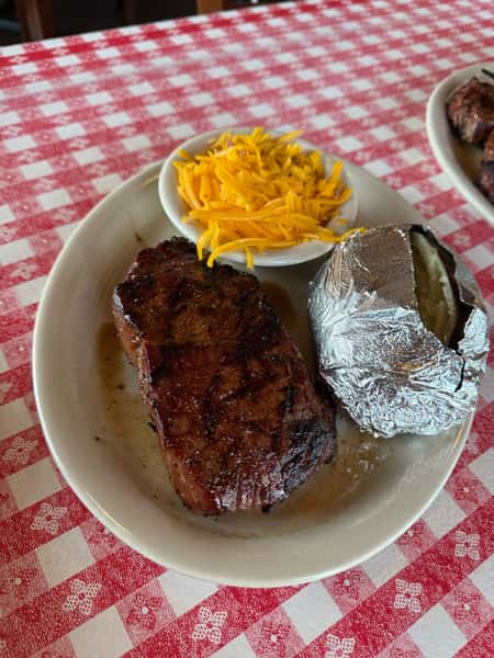 NY Strip w/ 2 premium sides