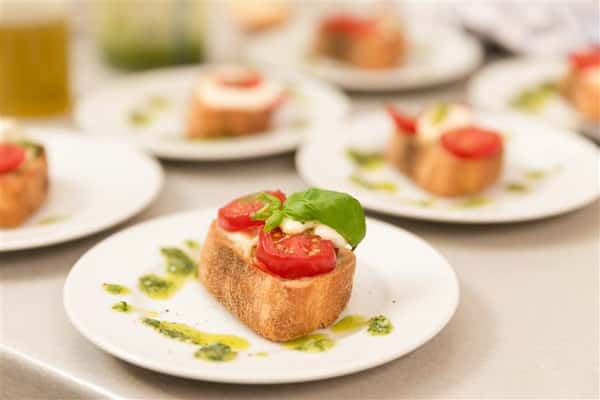 Puttanesca Tomatoes on Crostini