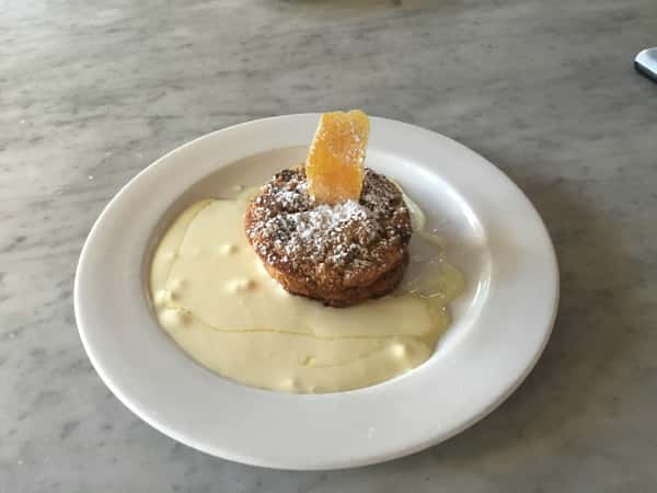 panettone bread pudding with amaretto crema and candied orange  