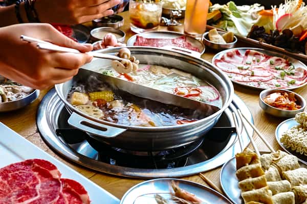 boiling meat over a hotpot