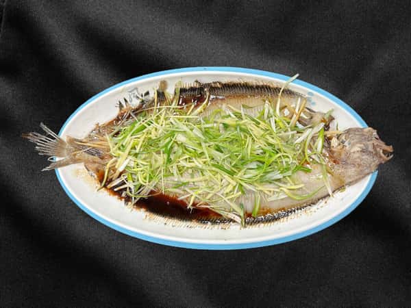 104 Steamed Whole Flounder with Ginger and Scallions