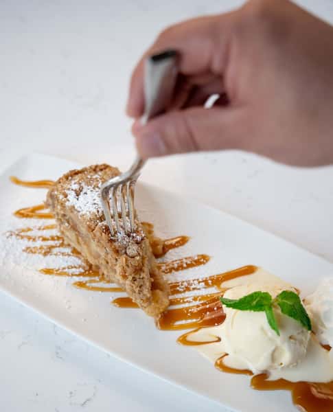 slice of cake with a caramel drizzle