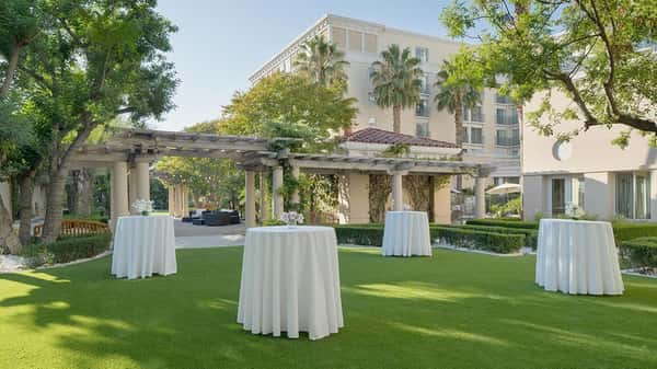 Garden area setup for a standing cocktail hour event