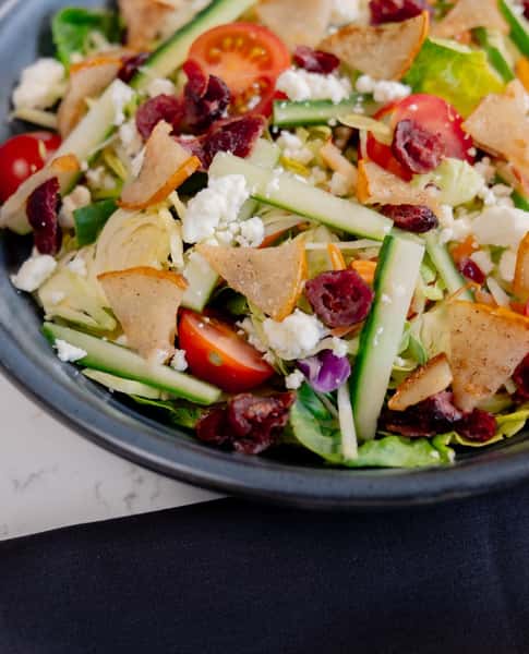 Salad with cheese, cucumber, and tomatoes