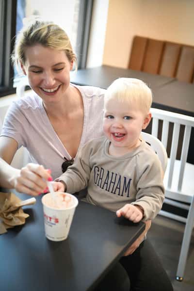 Woman and child enjoying ice cream