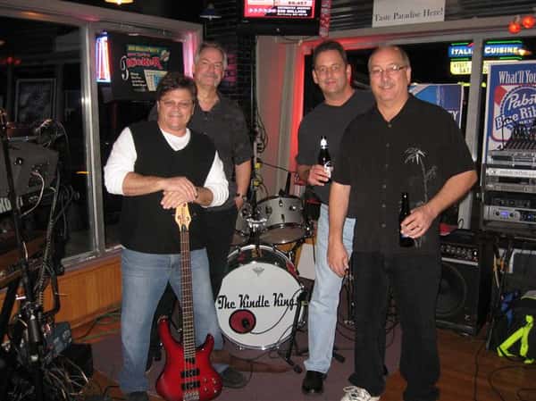 members of a band posing for a picture