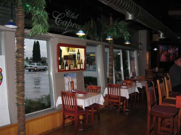 inside dining area with tables and chairs