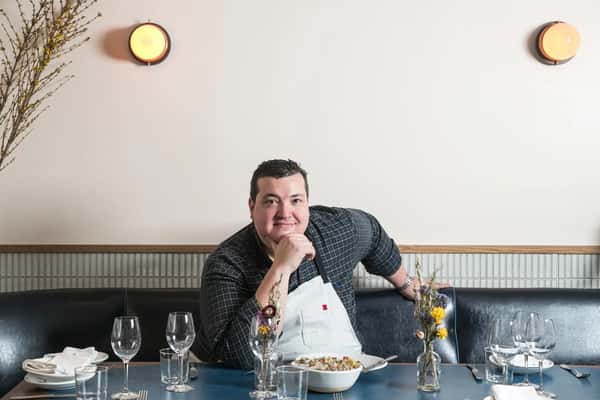 Photo of a chef posing for a opinion piece about the Shrimp Scampi at St. Tropez in West Village by the New York Times