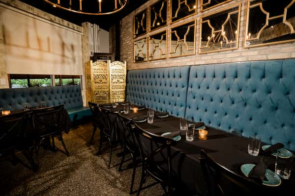Private dining room with tables and booth seating