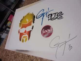 signed paper by diners, drive-ins & dives star