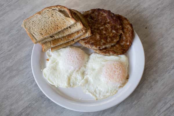 #3 Two Eggs, Toast & Sausage, Bacon or Ham