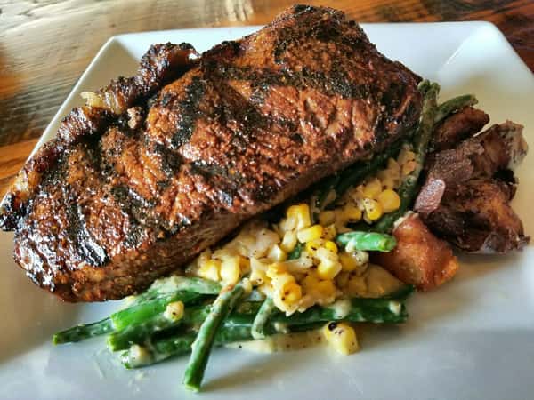 steak with corn and string beans