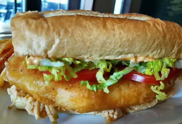 fried fish sandwich in a large sub