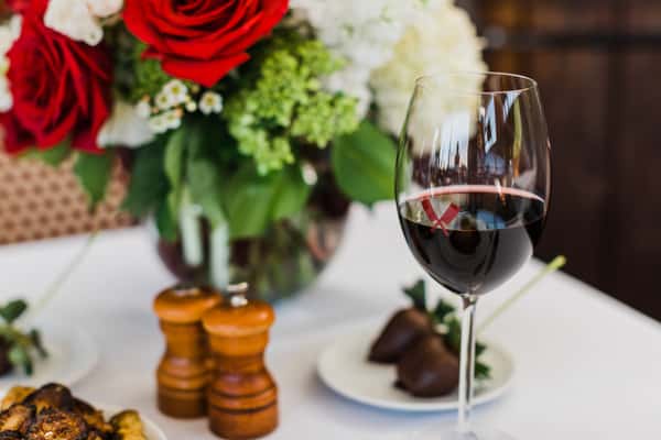 table with wine and flowers