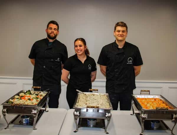 staff with catering trays