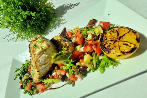 plated chicken dinner with vegetables