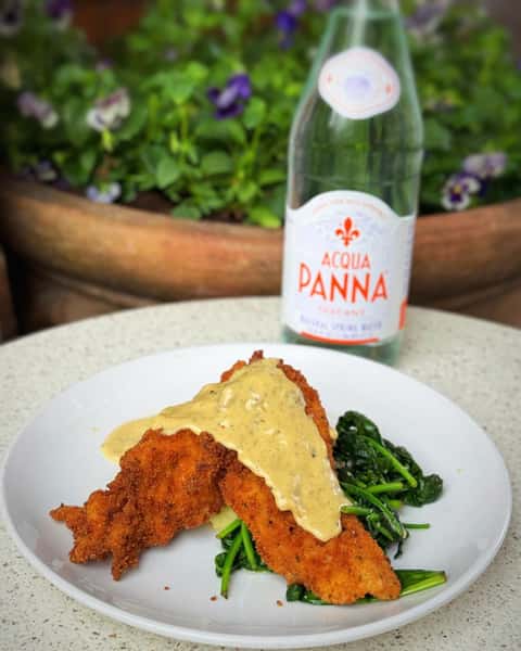Crispy panko-fried chicken breast, sautéed spinach, mashed potatoes, finished with mustard velouté sauce