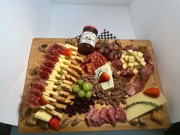 Charcurtrie served on a wood cutting board 