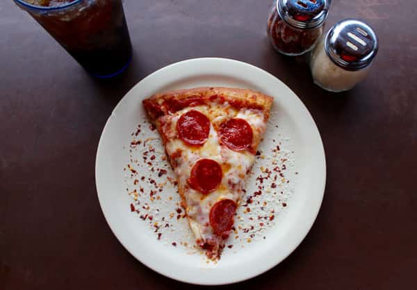 slice of pizza on a plate