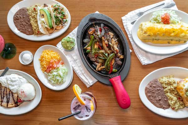 variety of dishes and fajitas