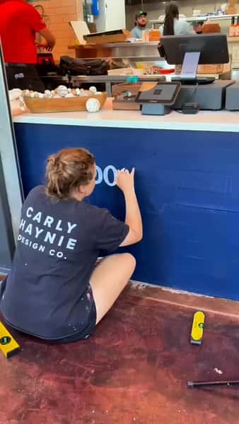 It's cool to hire local artists to make your location pop! Shout out to @carlyhaynie for hand drawing and incorporating our new Dock Local design on our locations. #livelocaleatcoastal ⚓️