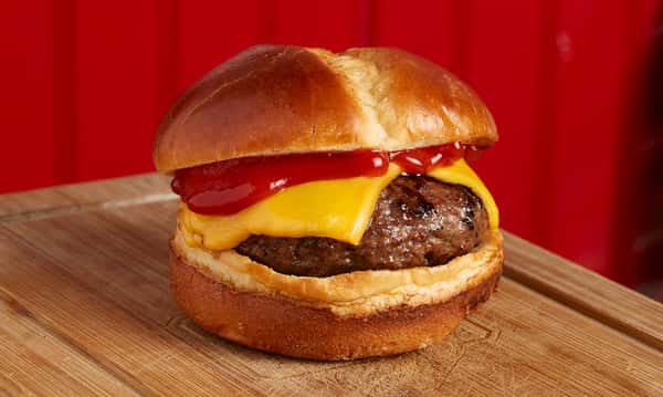 Burger with cheese and ketchup